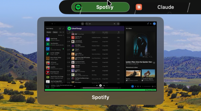 The pointer resting on the Spotify pill, with a live preview of that Space hanging beneath it